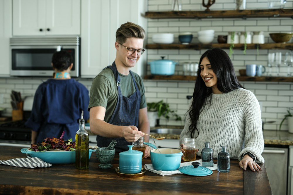 People preparing food together in a kitchen